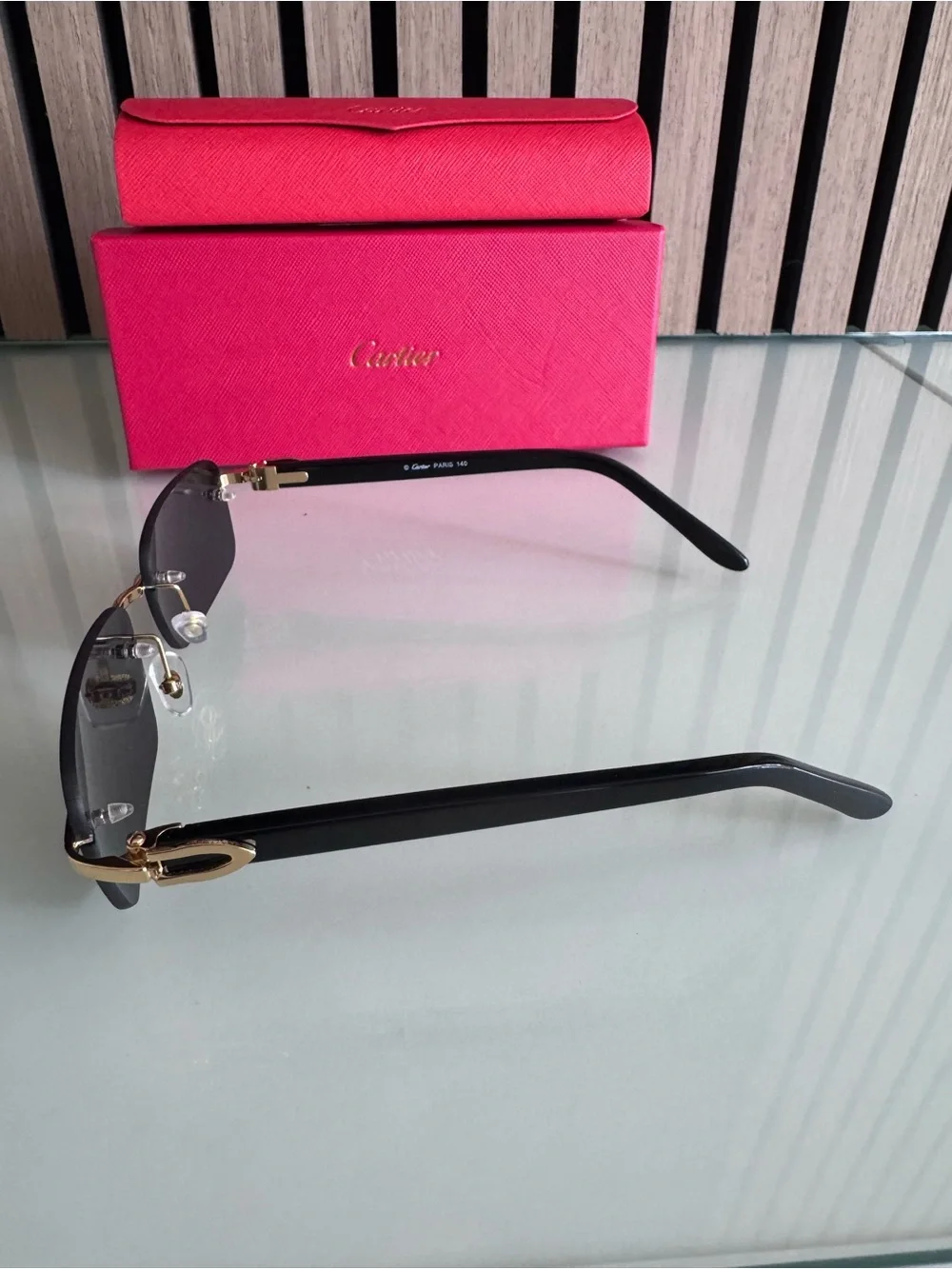Cartier Black and Gold Rimless Sunglasses with Red Case